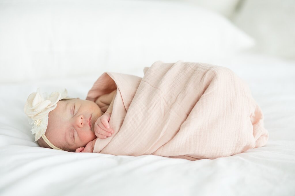 Light and airy Akron newborn photography baby girl in swaddle newborn photos