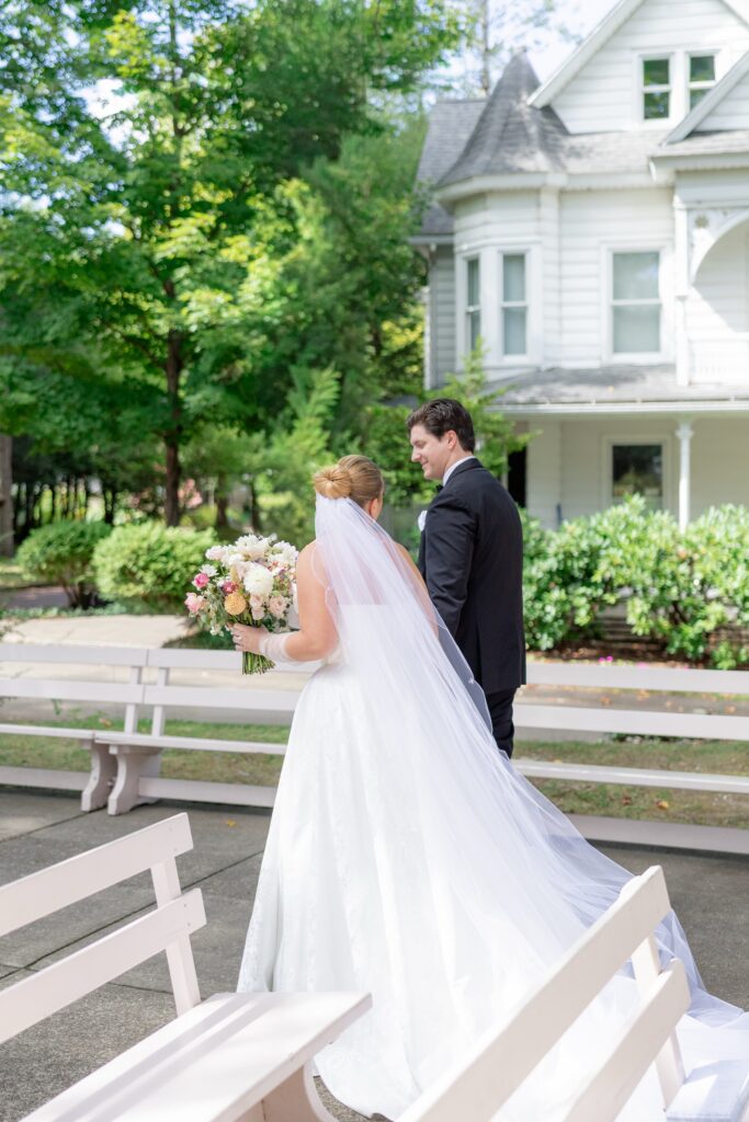 Chautauqua Lake wedding Bride and Groom walking away from ceremony at the Hall of Philosophy