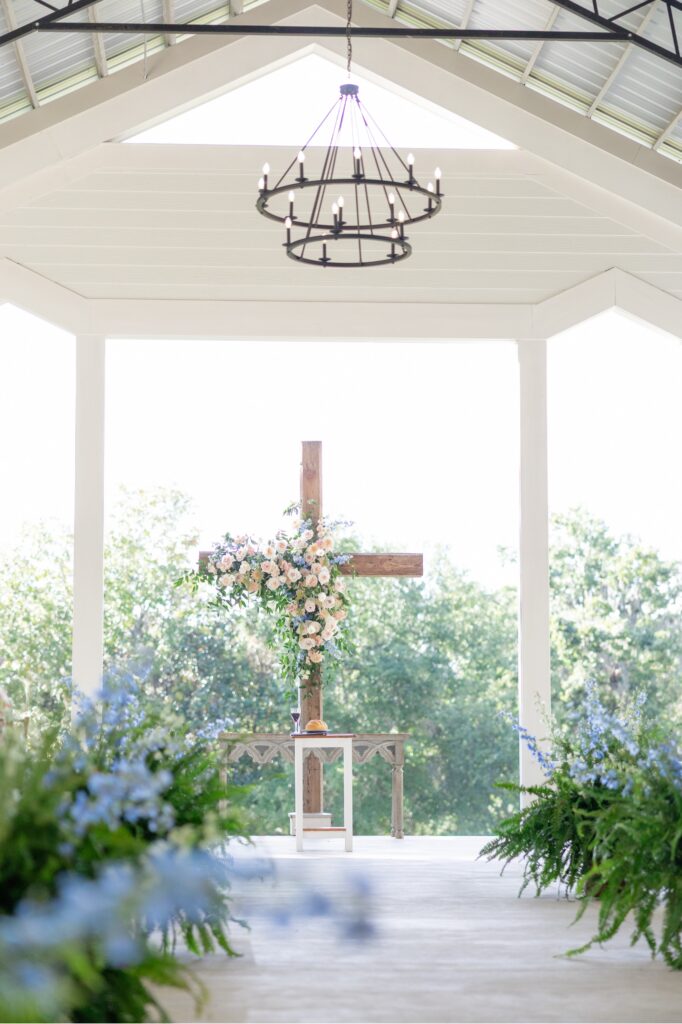 Fox Hill Wedding Outdoor Ceremony White Pavilion with Cross and Flowers