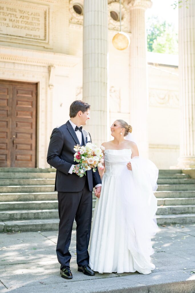 Chautauqua Lake wedding portraits Bride and Groom Standing Outside the Hall of Christ