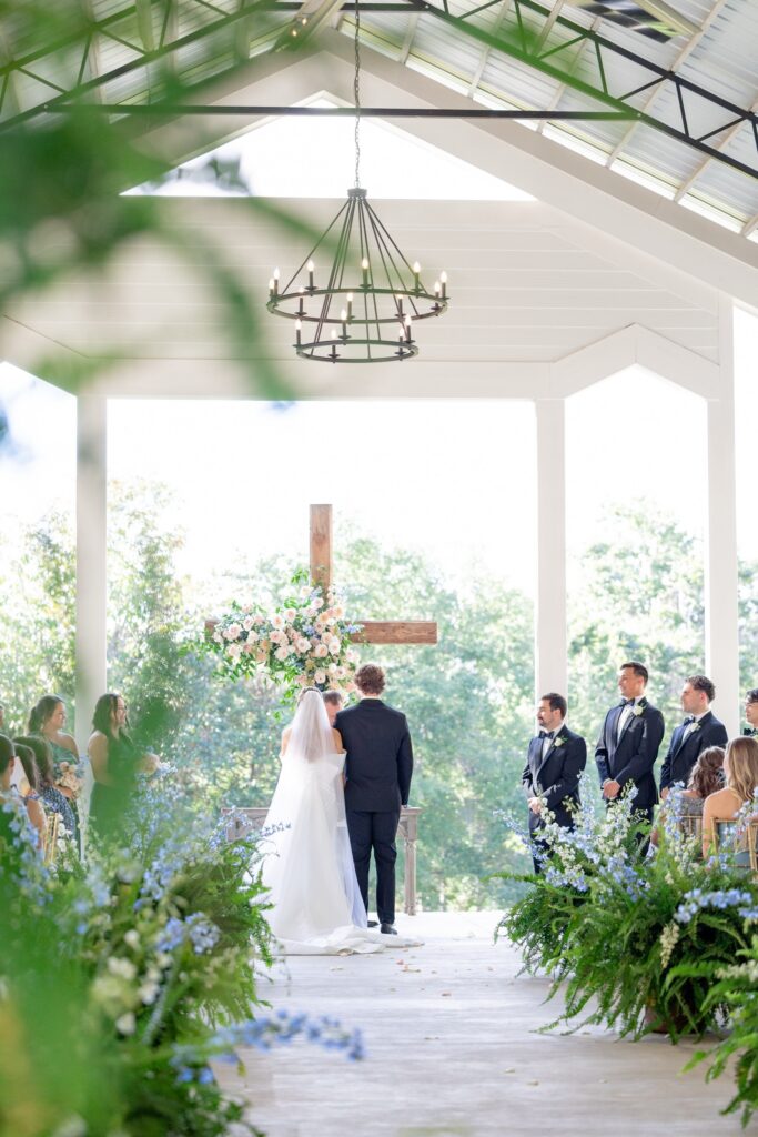 Fox Hill Wedding Outdoor Ceremony Bride and Groom exchanging vows