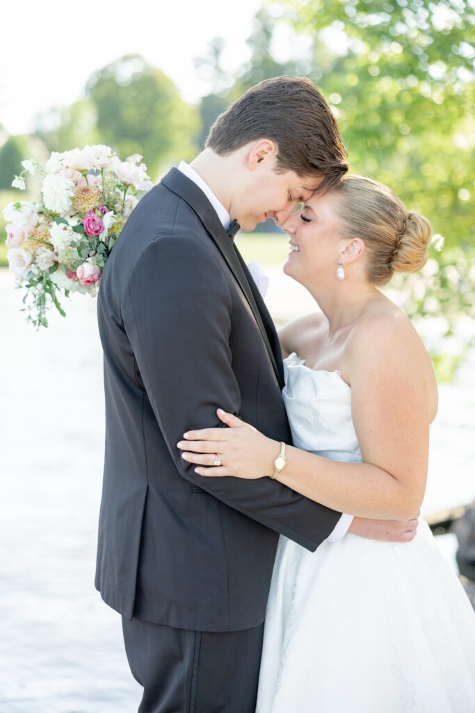 destination wedding Ohio photographer travels to Chautauqua Lake bride and groom blissful portraits lakeside