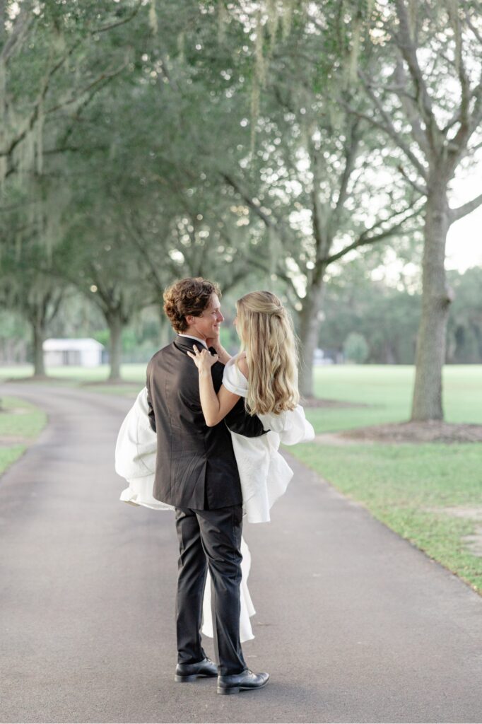 Fox Hill Plantation Destination Wedding Photographer Bride and Groom amongst spanish moss trees