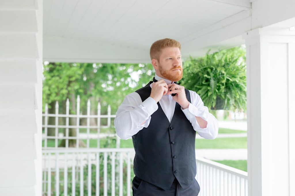 1840 Manor House Front Porch Groom getting Ready