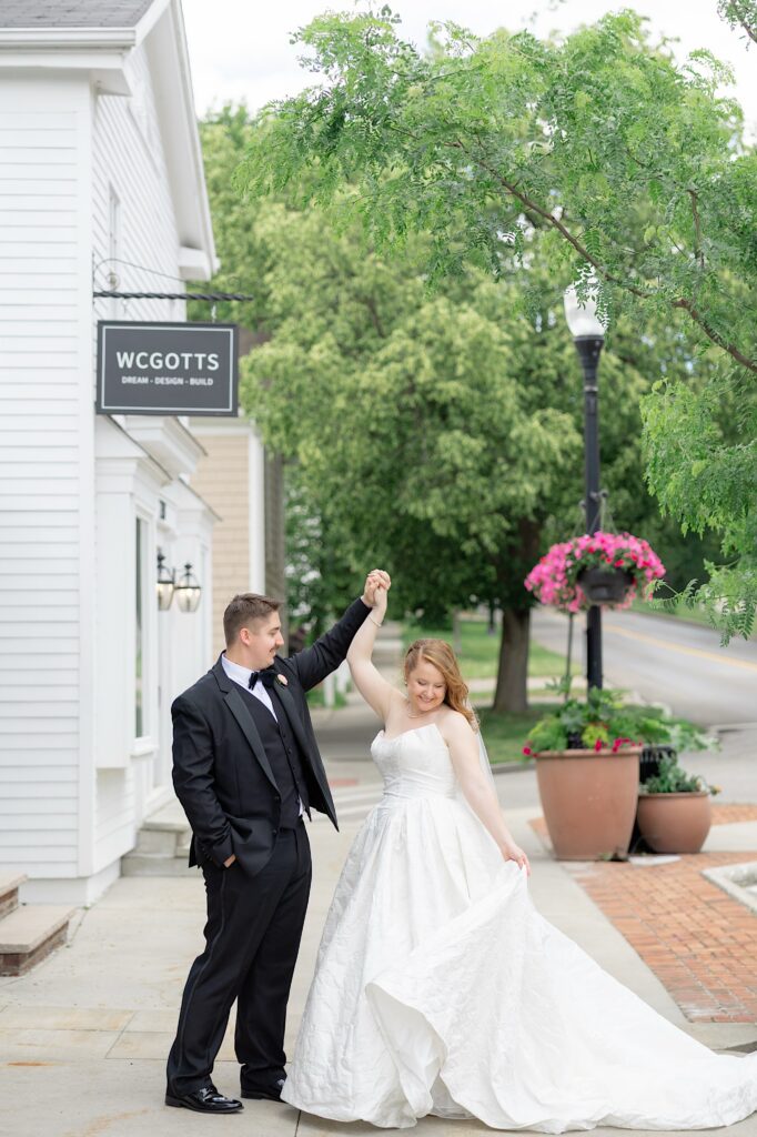Main Street Hudson Ohio Wedding Photos Bride and Groom Spinning