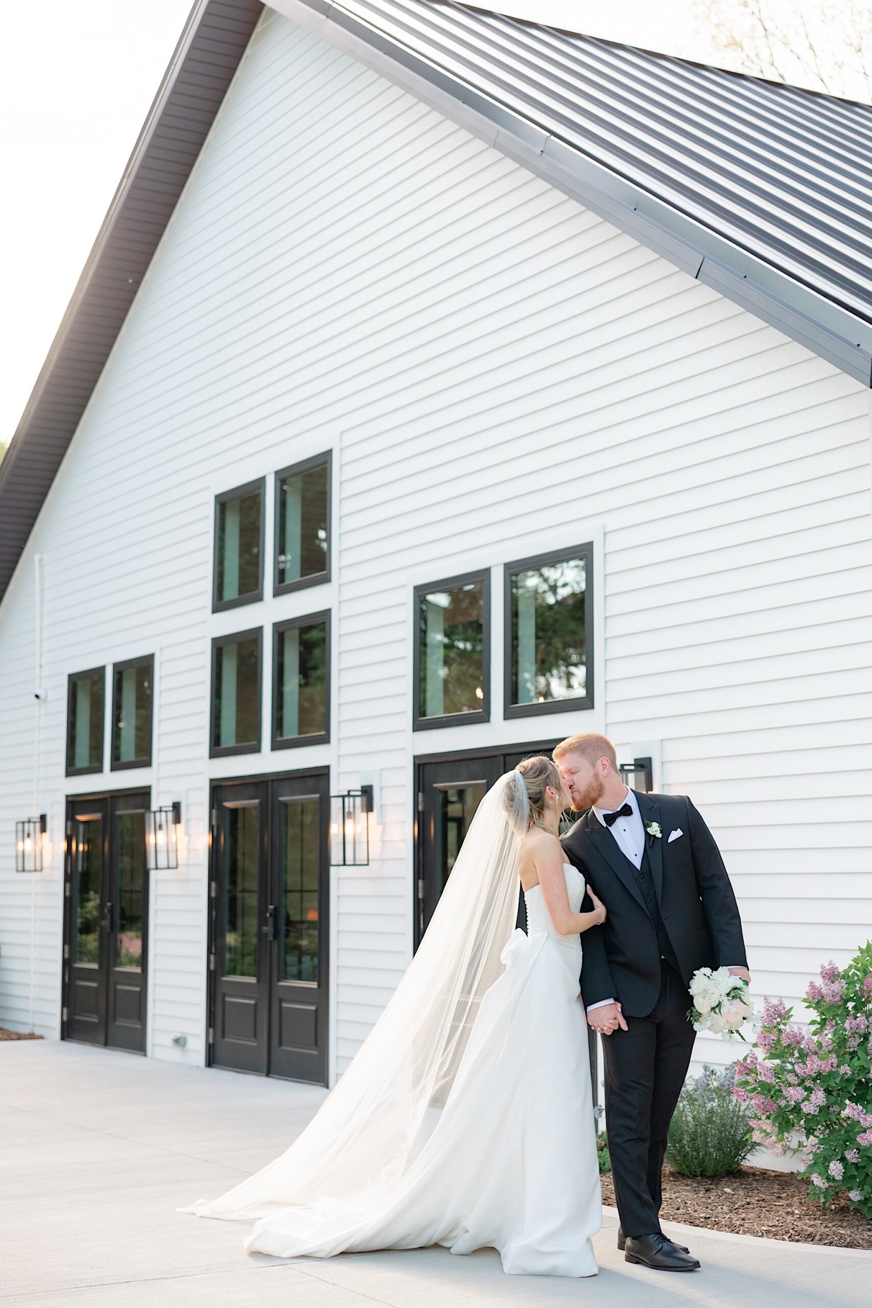 1840 Manor House Wedding Akron Ohio Bride and Groom Kissing