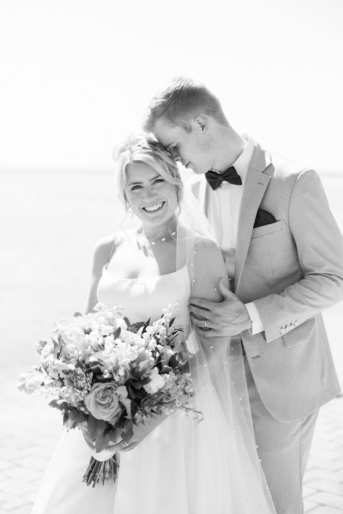 East 9th Street Pier wedding portraits bride and groom smiling