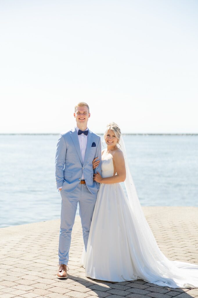 Cleveland waterfront Lake Erie wedding portraits at East 9th Street Pier wedding portraits bride and groom smiling